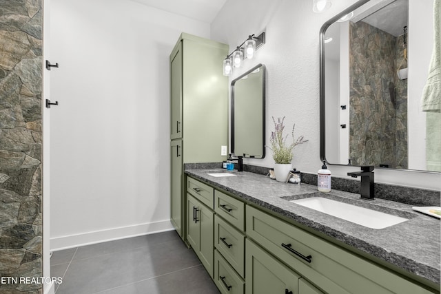 bathroom with tile patterned flooring and vanity