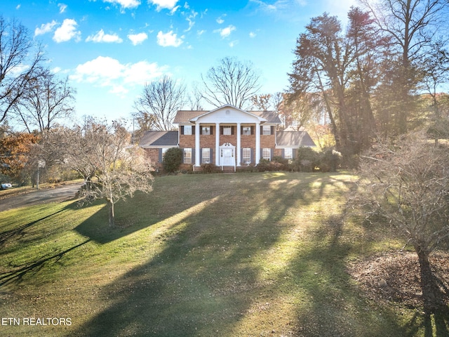 exterior space featuring a front yard