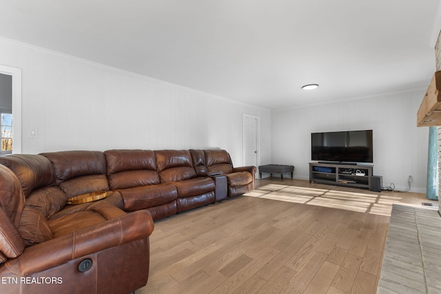 living room with light hardwood / wood-style flooring