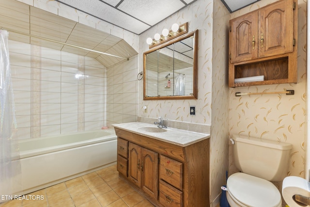 full bathroom with toilet, vanity, tile patterned floors, and tiled shower / bath