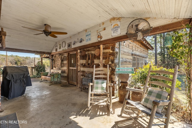 view of patio featuring area for grilling and a ceiling fan