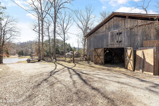 exterior space featuring a barn