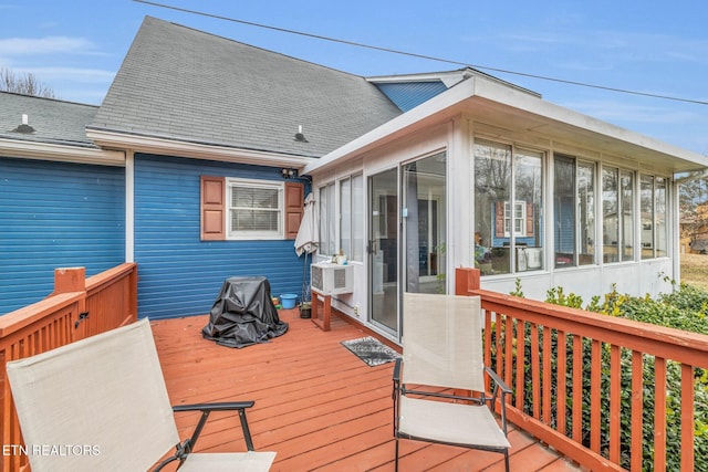 wooden terrace with a sunroom