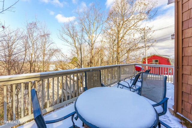 view of snow covered deck