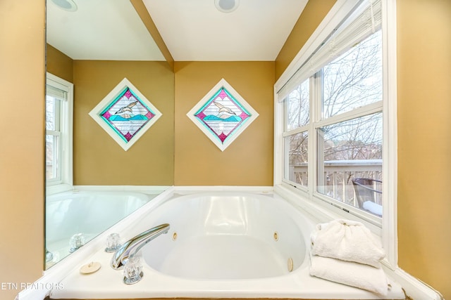 bathroom featuring a tub