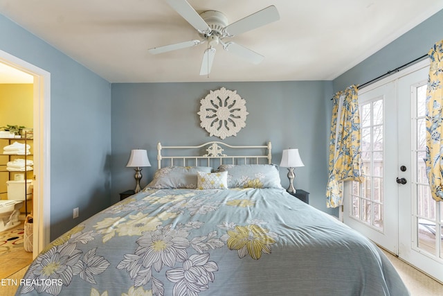 bedroom featuring french doors, ceiling fan, and access to outside