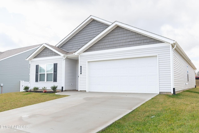 ranch-style house featuring a front lawn, concrete driveway, and an attached garage