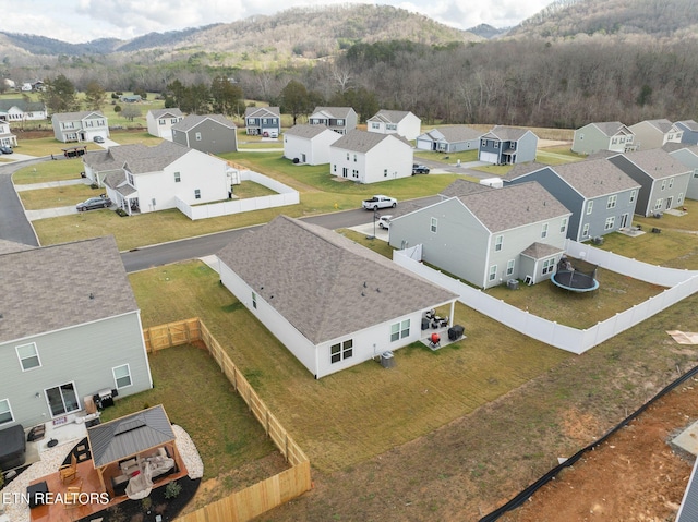 birds eye view of property featuring a mountain view