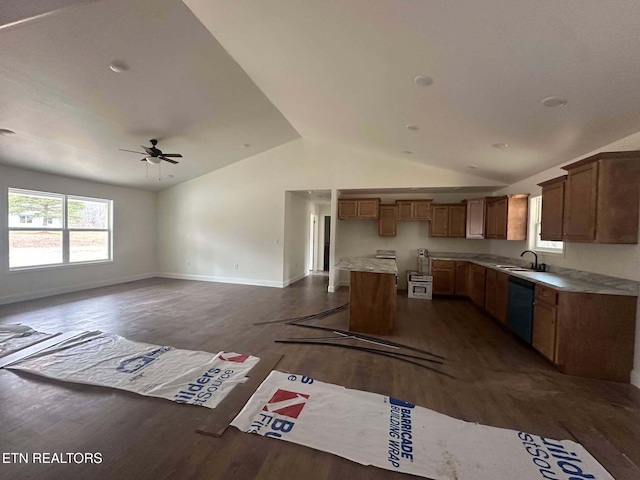 kitchen with dishwasher, dark hardwood / wood-style flooring, lofted ceiling, a kitchen bar, and a kitchen island