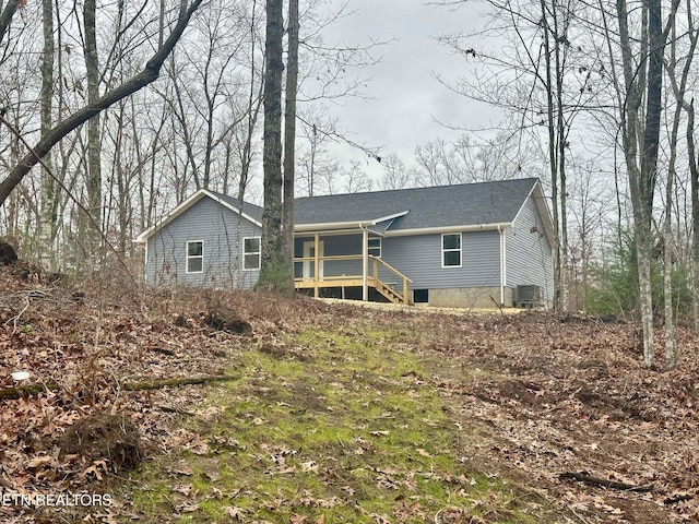 rear view of house with central AC