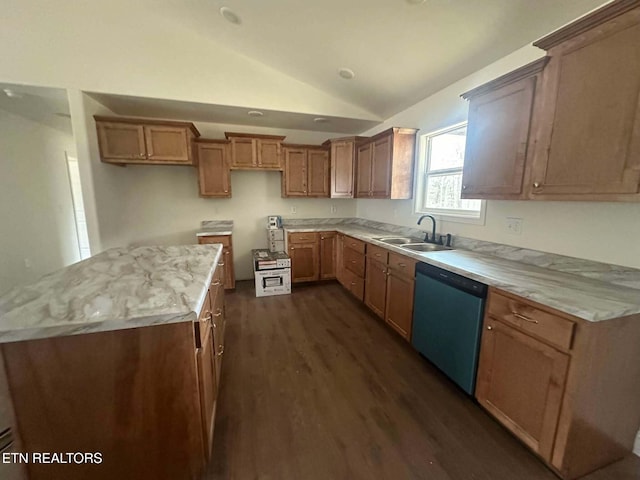 kitchen featuring dishwasher, lofted ceiling, sink, a kitchen island, and dark hardwood / wood-style flooring