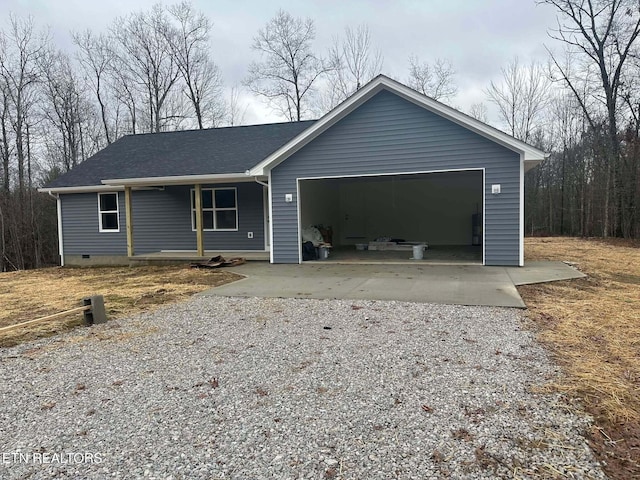 single story home with a garage