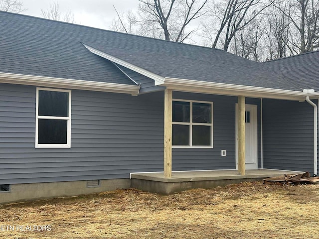 view of home's exterior with a porch