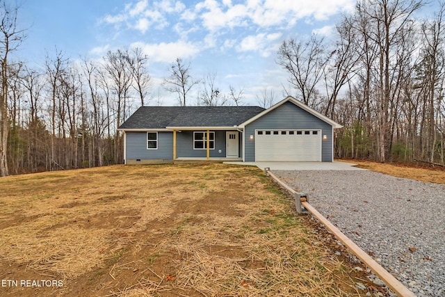 view of front of house with a garage and a front yard