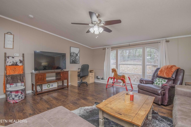 living room with crown molding, ceiling fan, and dark hardwood / wood-style floors