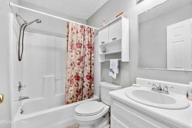 full bathroom with vanity, shower / tub combo, a textured ceiling, and toilet