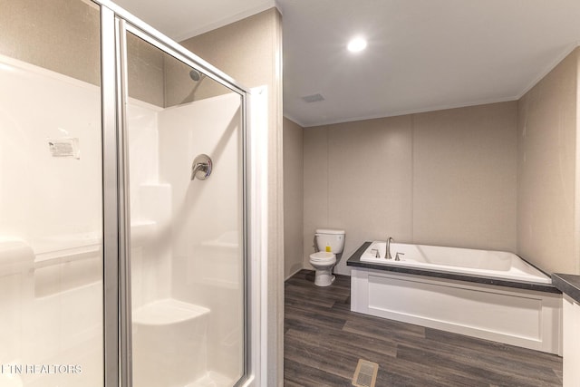 bathroom featuring separate shower and tub, toilet, and wood-type flooring