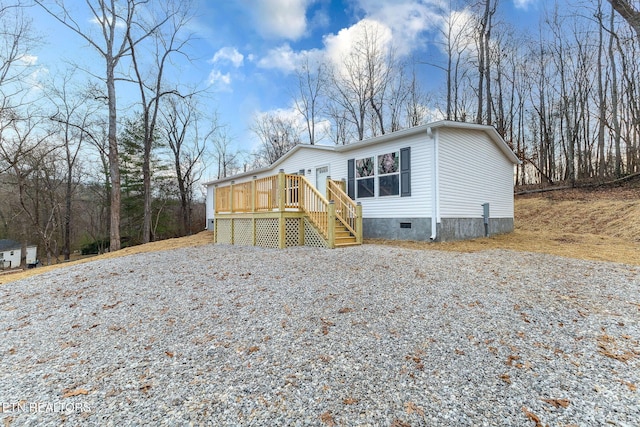 view of front of home with a deck