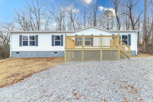 view of front of property featuring a wooden deck