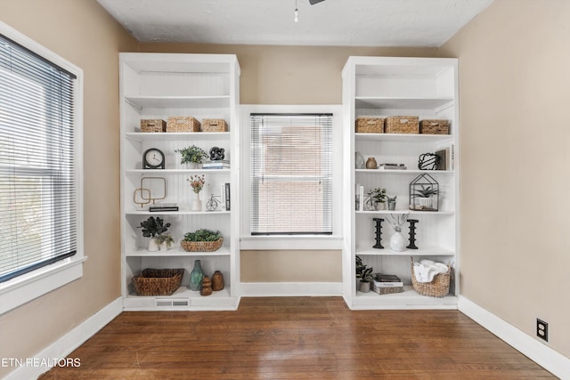 mudroom with dark wood-type flooring