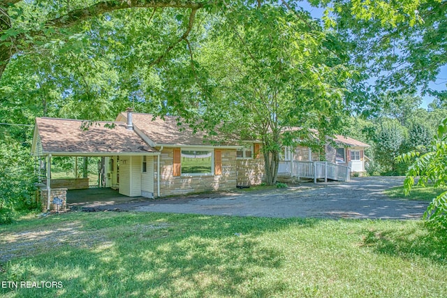 view of front of home with a front yard