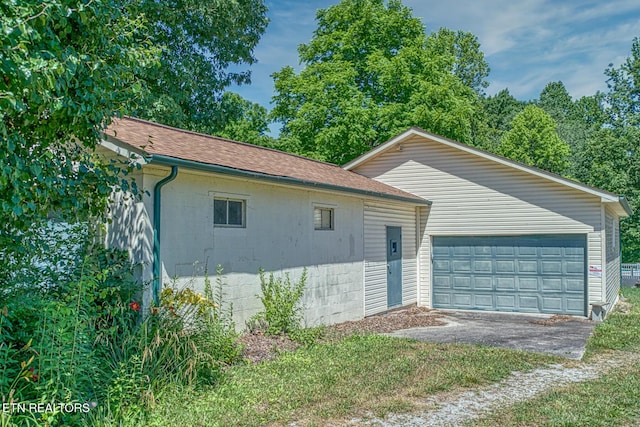 view of front of home with a garage