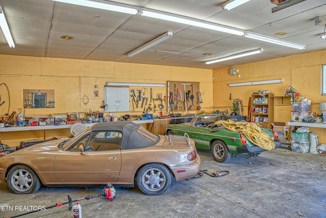 garage with a workshop area