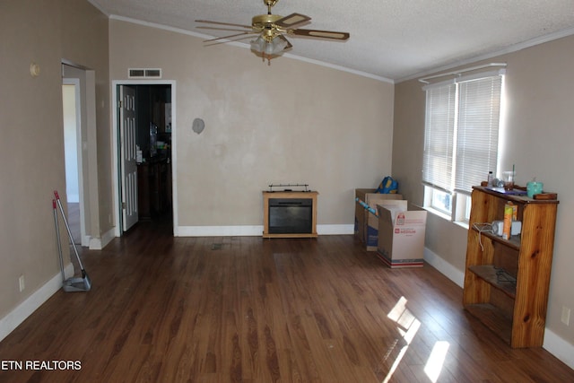 unfurnished living room with vaulted ceiling, ceiling fan, a textured ceiling, and dark hardwood / wood-style floors