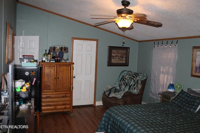 bedroom with ceiling fan, dark wood-type flooring, vaulted ceiling, and ornamental molding