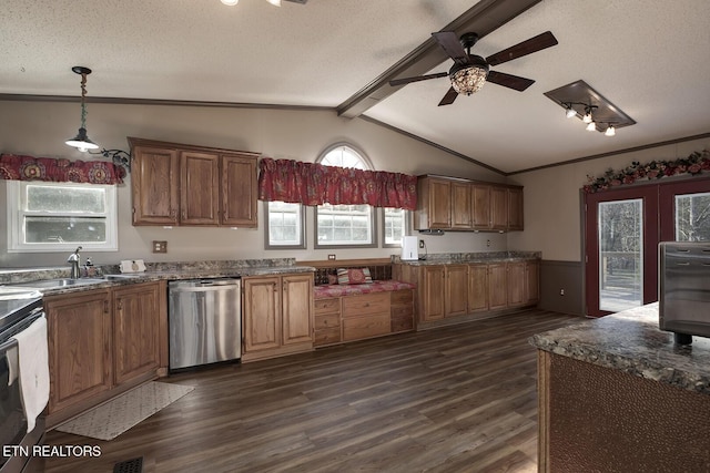 kitchen featuring a textured ceiling, dishwasher, lofted ceiling with beams, and hanging light fixtures