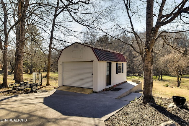 view of outbuilding with a garage