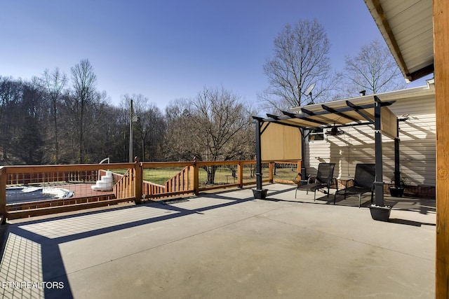 view of patio / terrace with a pergola and a deck