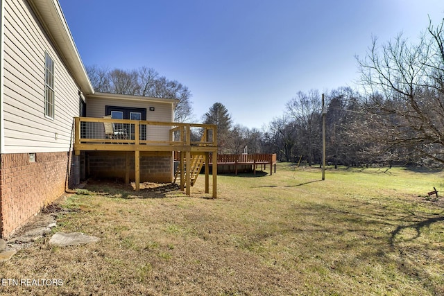 view of yard featuring a deck