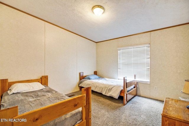 bedroom with light carpet, crown molding, and a textured ceiling