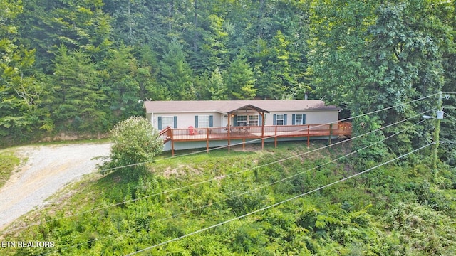 view of front of house featuring a deck