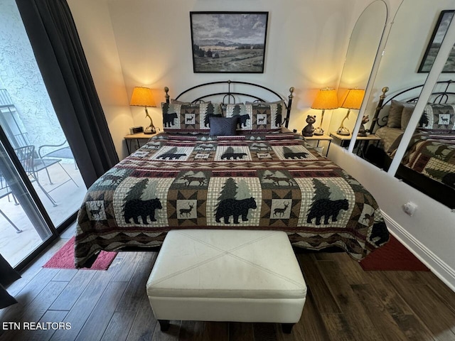 bedroom with dark wood-type flooring