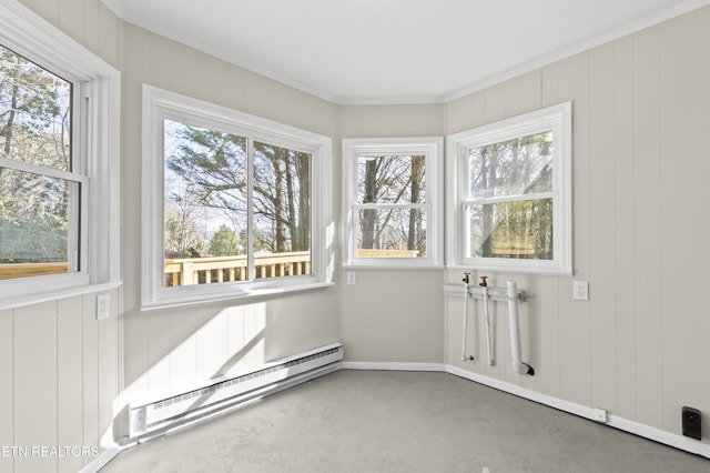 unfurnished sunroom featuring a baseboard heating unit