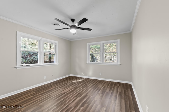 unfurnished room featuring ceiling fan, crown molding, and dark hardwood / wood-style floors