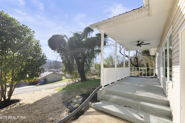 view of patio / terrace with ceiling fan and covered porch