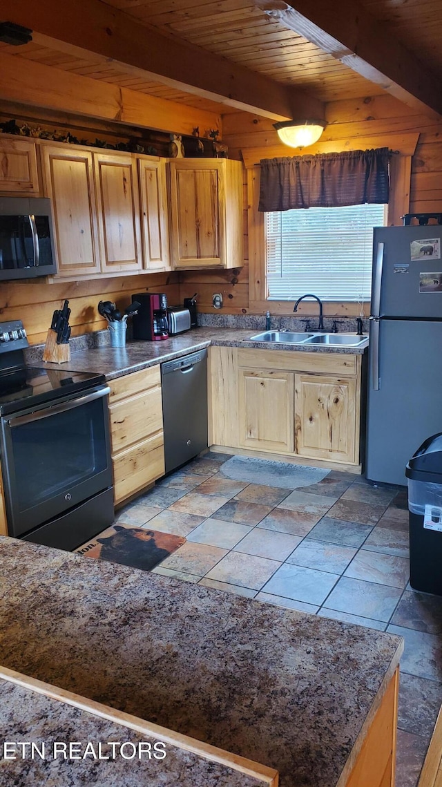 kitchen with sink, wooden ceiling, stainless steel appliances, beamed ceiling, and light brown cabinetry