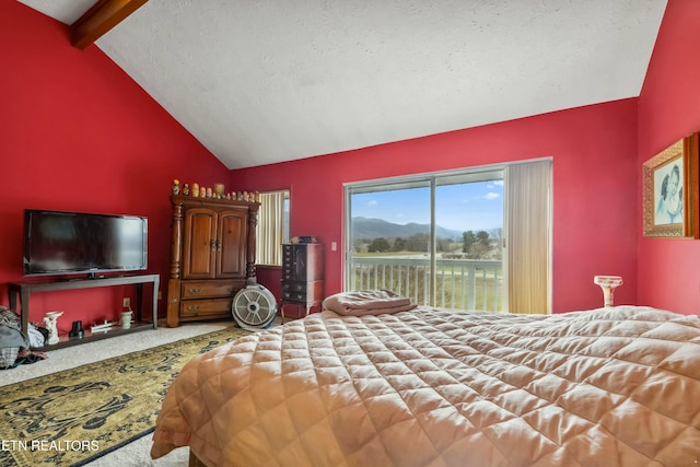 carpeted bedroom featuring lofted ceiling with beams, a textured ceiling, and access to outside