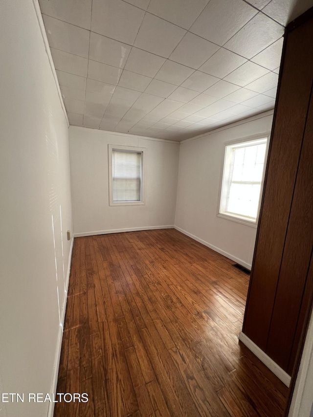 empty room featuring hardwood / wood-style floors