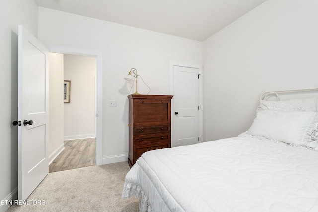 bedroom featuring carpet