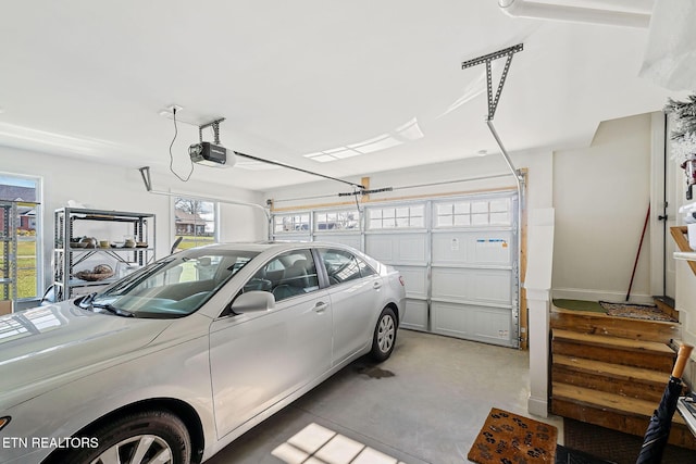 garage featuring a garage door opener