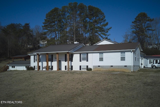 view of front of house with a front yard and a porch