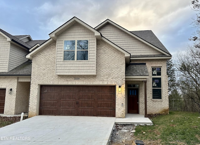 view of front of home with a garage