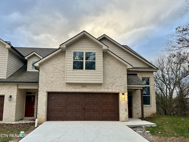 view of front of property with a garage