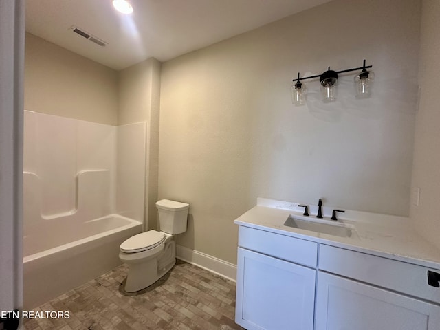 bathroom featuring visible vents, toilet, shower / washtub combination, baseboards, and vanity