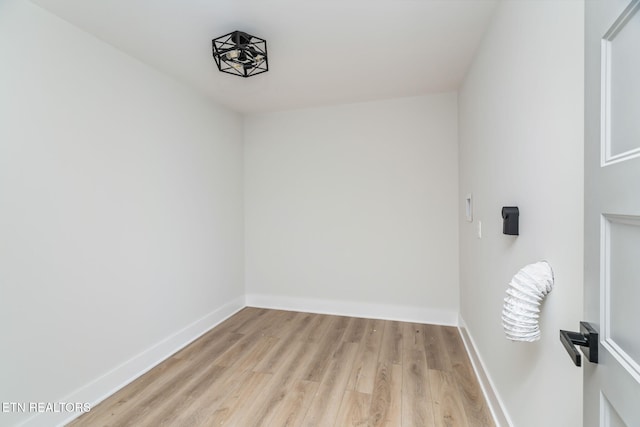 unfurnished room with light hardwood / wood-style flooring