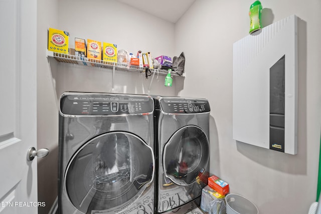 laundry area with washer and dryer